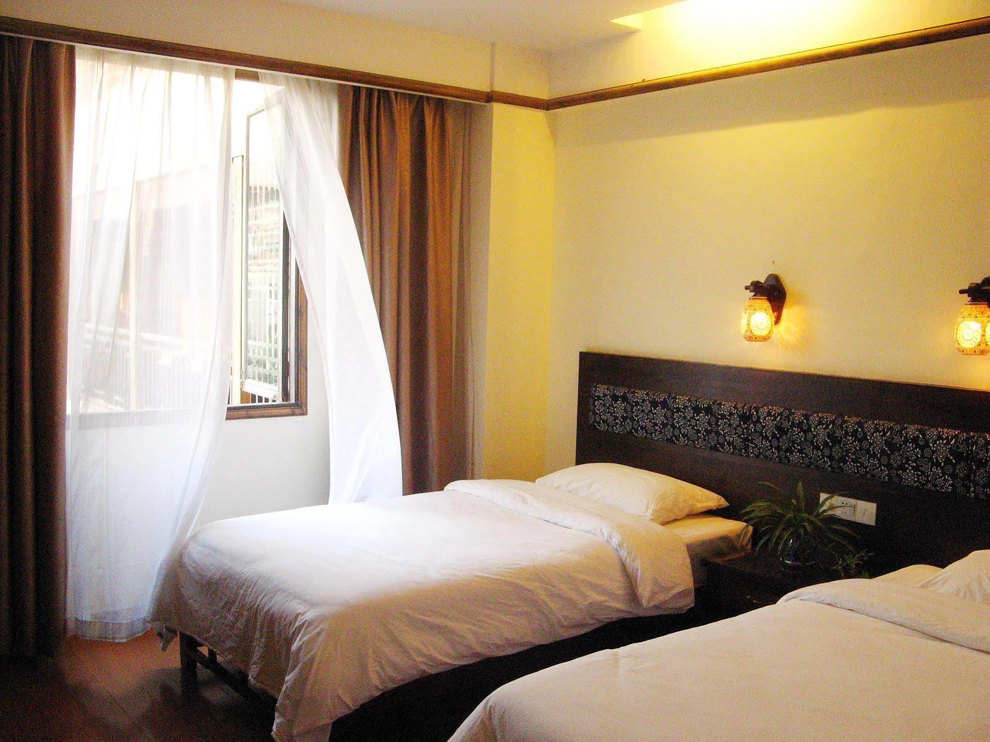 Bajie Youth Hostel Жангжиаже Екстериор снимка