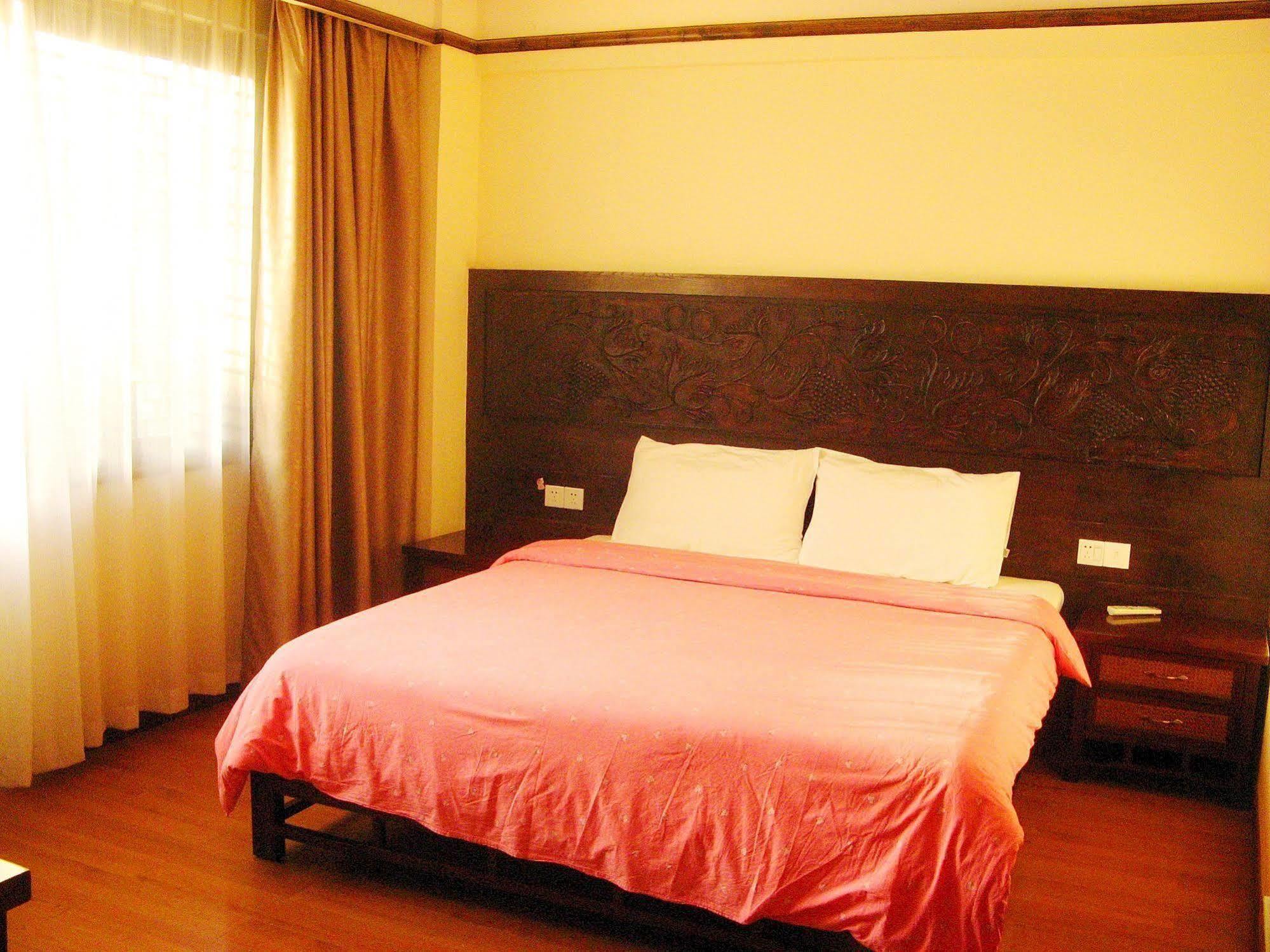 Bajie Youth Hostel Жангжиаже Екстериор снимка
