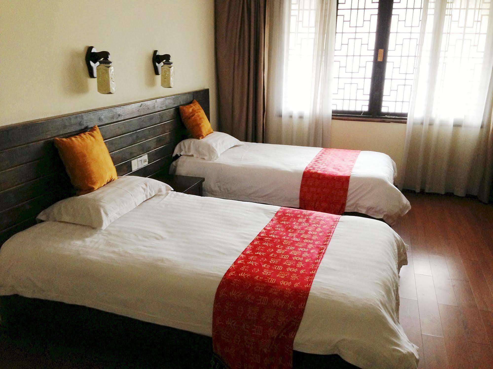 Bajie Youth Hostel Жангжиаже Екстериор снимка